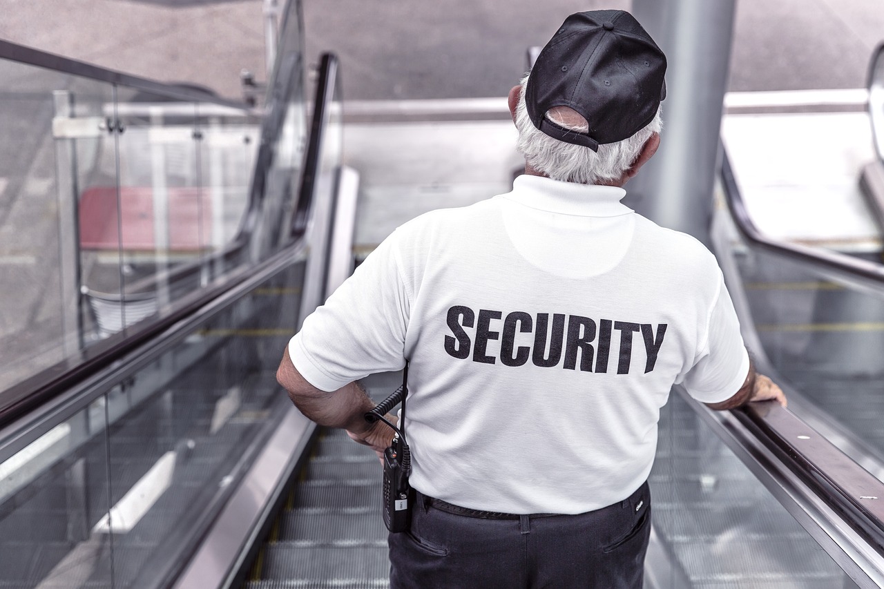 AF Patrol security guard protecting a commercial property in Orange County, offering 24/7 security services for businesses.